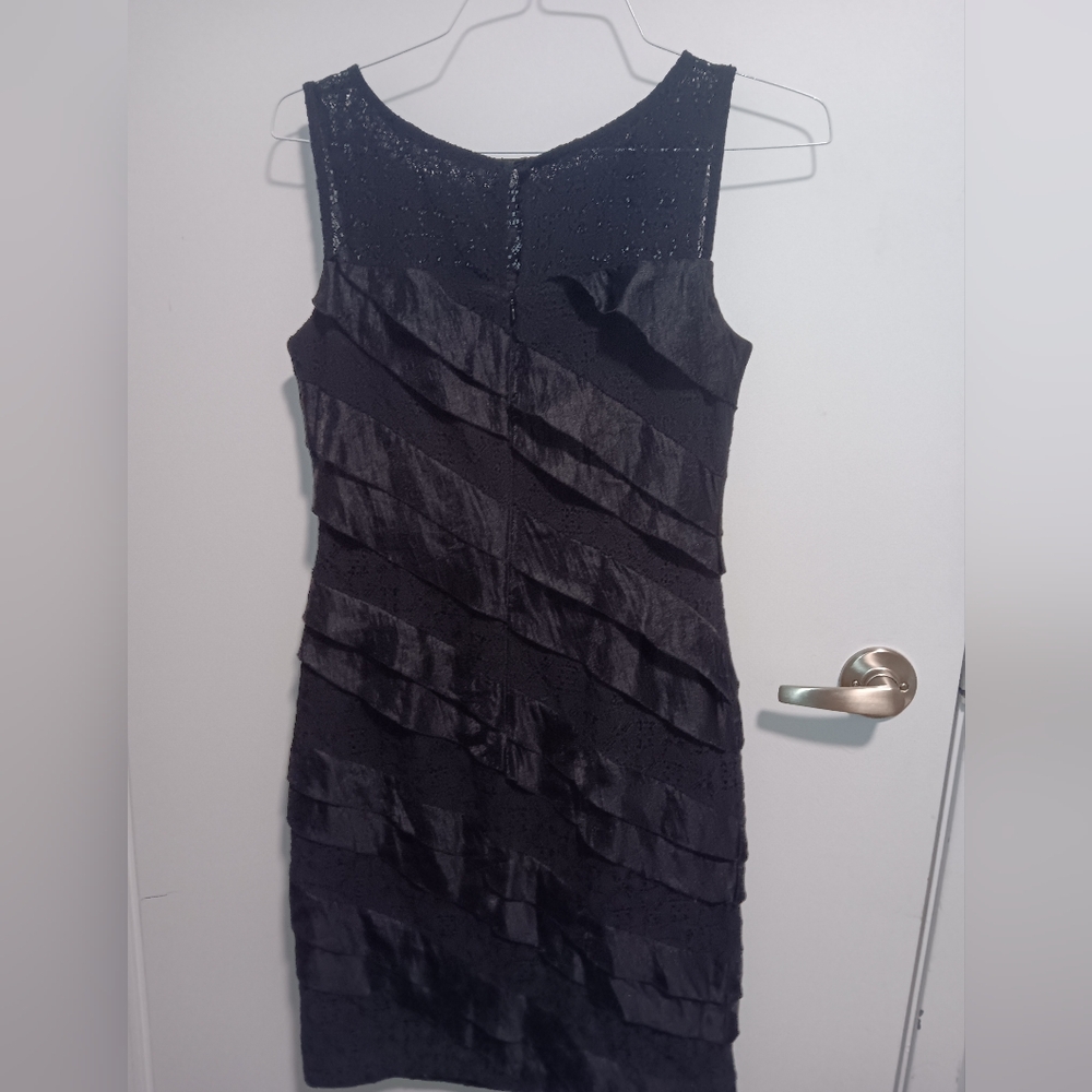 Maggie London for Melanie Lynn black cocktail dress size 10. Fitted
